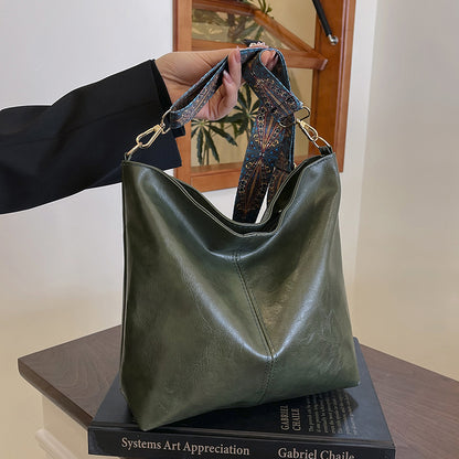 Demetra | Green lightweight PU leather bag for women