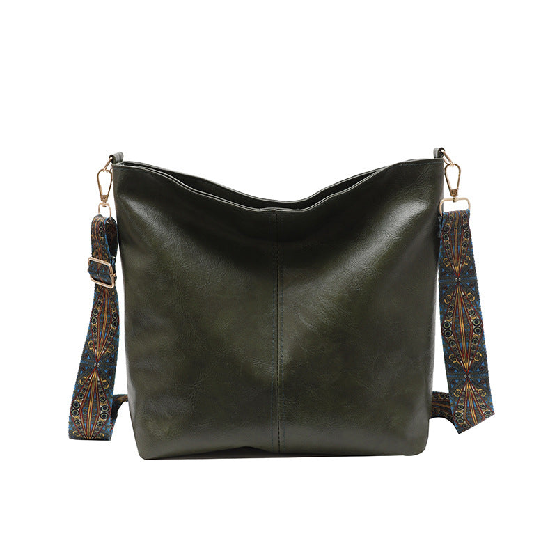 Demetra | Green lightweight PU leather bag for women