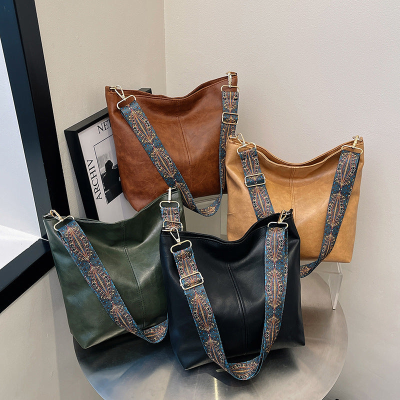 Demetra | Green lightweight PU leather bag for women
